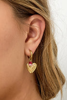 Earrings with heart and beads